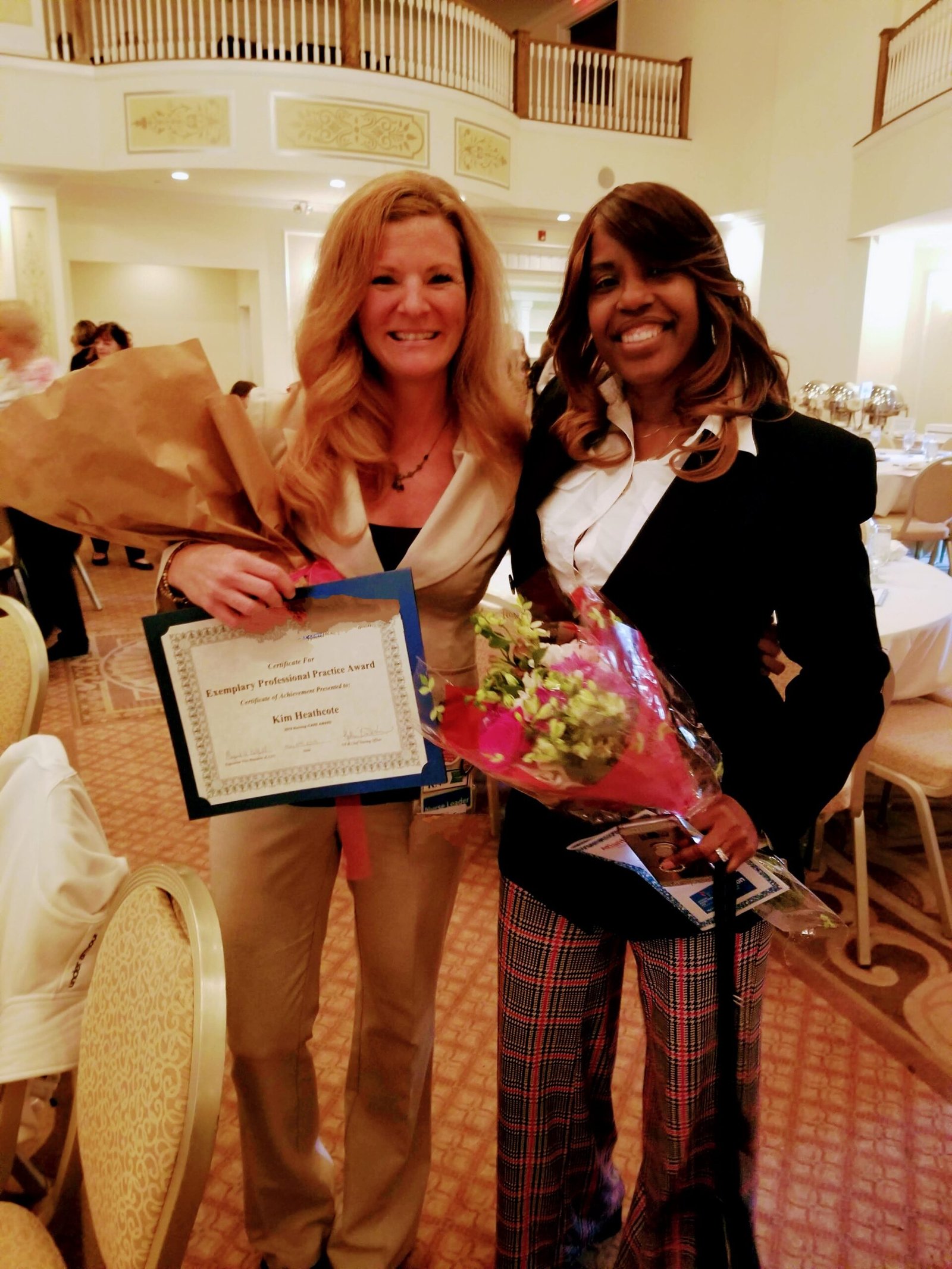 Kim Heathcote speaking at childbirth education workshop, engaging with expecting parents